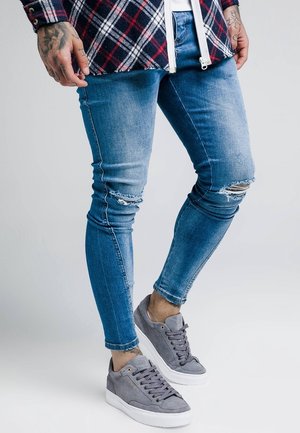 Vaqueros pitillo - blue denim