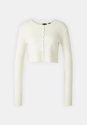 Hvit kort cardigan med lange ermer, rund hals og femknappslukking. Laget av mykt strikket stoff, med ribbede mansjetter.