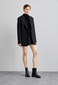 BONNI - Platform ankle boots - black