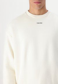 Calvin Klein NANO LOGO  - Melegítőfelső - vanilla ice