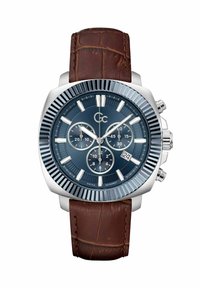 Reloj cronógrafo con esfera azul, caja plateada y correa de cuero marrón texturizado. Presenta marcadores prominentes, subesferas y visualización de la fecha.