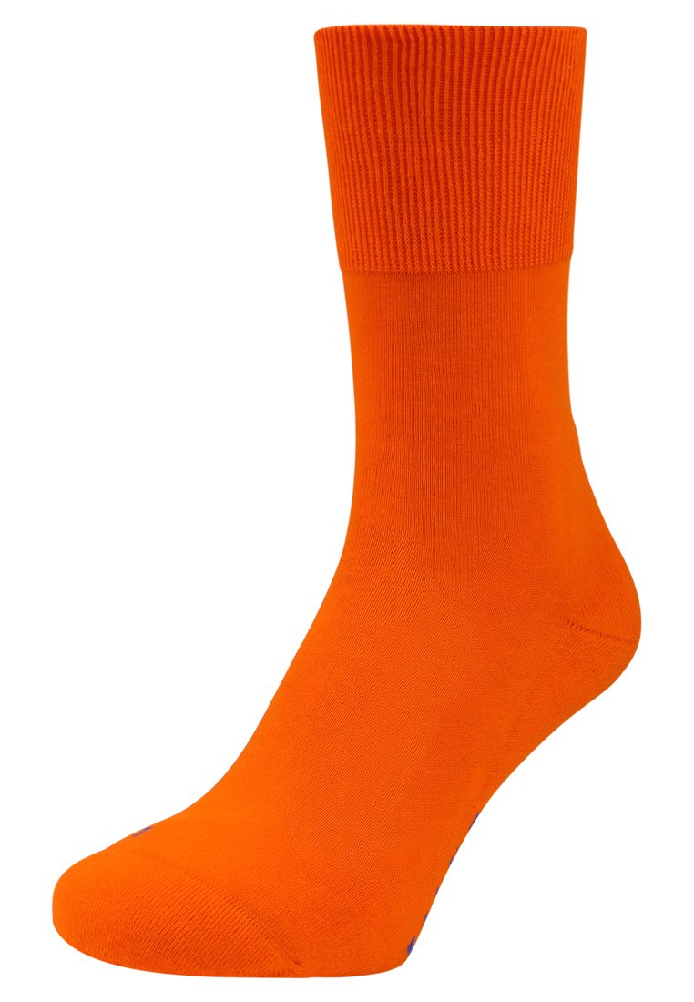 Calzino arancione brillante con bordo a costine, texture liscia e tallone e punta rinforzati per una maggiore durata. Adatto per un abbigliamento casual.