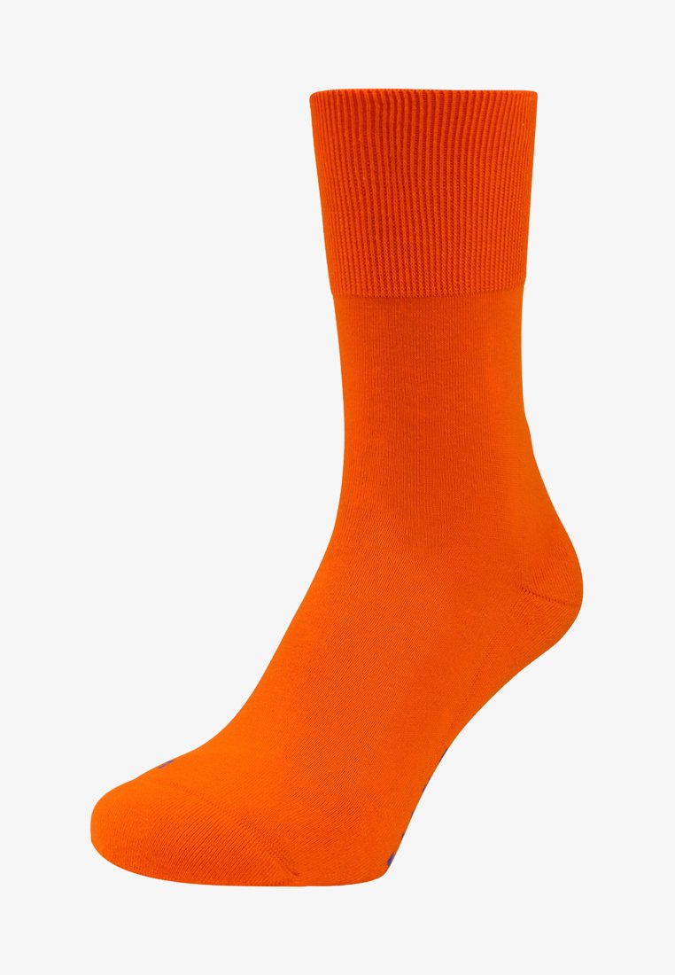 Chaussette orange vif avec une bordure à côtes, texture lisse et renfort à la pointe et au talon pour plus de durabilité. Convient pour un port décontracté.