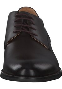 Schwarze Lederschuh mit runder Zehenform, geschnürtem Vorderteil und glatter Textur. Hat ein minimalistisches Design und braune Schnürsenkel.