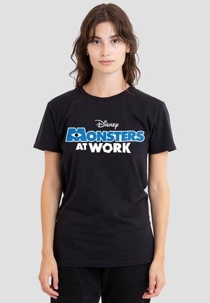 Black cotton t-shirt featuring "Disney Monsters at Work" graphic in blue and white. Short sleeves and round neckline.
