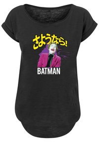 Juodas trumpomis rankovėmis marškinėliai su juokingo personažo, vilkinčio rožinę kostiumą, grafika, su japonišku tekstu ir „BATMAN“ raiškiai užrašytu.