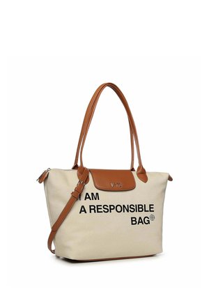Sac fourre-tout beige et marron avec deux poignées, une bandoulière réglable, et texte « JE SUIS UN SAC RESPONSABLE » imprimé à l'avant.
