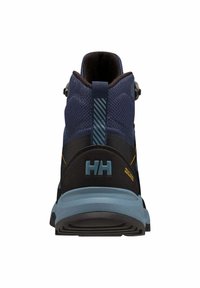 Botas de senderismo para hombre con un upper de textil en color azul marino, acentos en negro y una suela azul claro. Presentan un bucle en el talón a rayas y un detalle del logo.