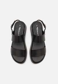 Sandales en cuir noir avec deux larges brides et boucles à la cheville, taille 37, présentées côte à côte sur un fond blanc.