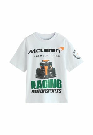White T-shirt with McLaren Formula 1 Team logo, front image of an F1 car, and green "Racing Motorsports" text.