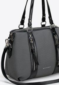 Šedá texturovaná látková kabelka s černými koženými detaily, dvojitými horními uchy, odnímatelným popruhem a stříbrnými kovovými prvky. Značka "WITTCHEN" je zobrazená.