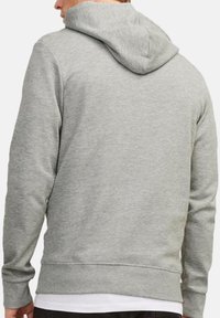 Gray hoodie with a front kangaroo pocket, long sleeves, and a drawstring hood. Made from soft, textured fabric, featuring ribbed cuffs and hem.