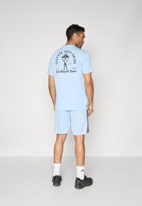 adidas Performance Športové šortky - glow blue/black
