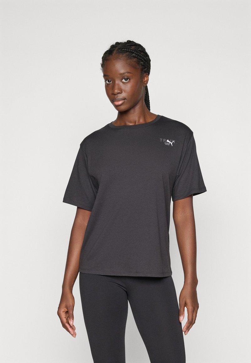 Puma PRETTY TOUGH GRAPHIC TEE - Sportovní tričko - black