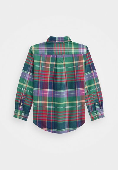 Chemise à carreaux verts à manches longues, avec des motifs rouges, bleus et violets, col boutonné et poignets boutonnés. En matériau coton.