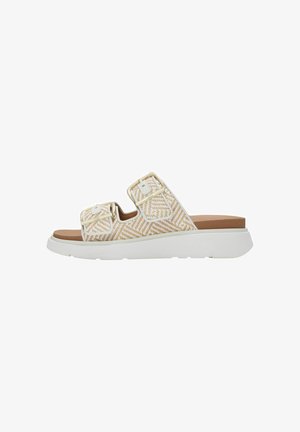 Sandale slide beige et blanche à motifs avec deux brides ajustables et boucles, dotée d'une semelle blanche épaisse et d'une semelle intérieure rembourrée.