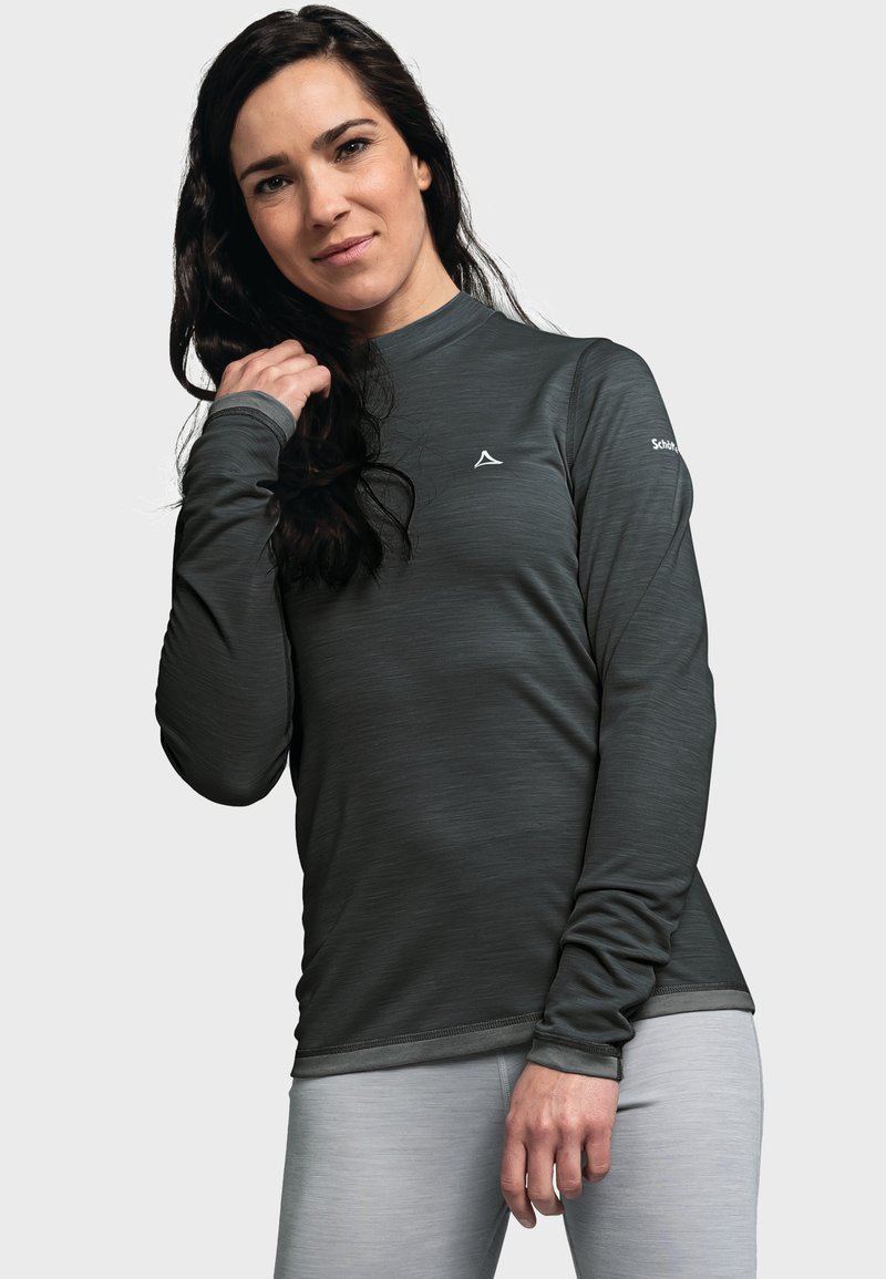 Langärmliges Sporttop in Dunkelgrau, aus strukturiertem Stoff. Mit einem figurbetonten Schnitt, Rundhalsausschnitt und dezentem Logo auf der Brust.