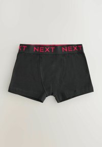 Svarta boxerkalsonger med mjukt material och elastiskt midjeband med "NEXT" i ljusrosa bokstäver. Klassisk snitt, designade för komfort.