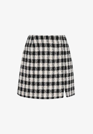 Czarna i biała mini spódniczka w kratkę z teksturowanym wykończeniem, z asymetrycznym dołem i dopasowaną talią.