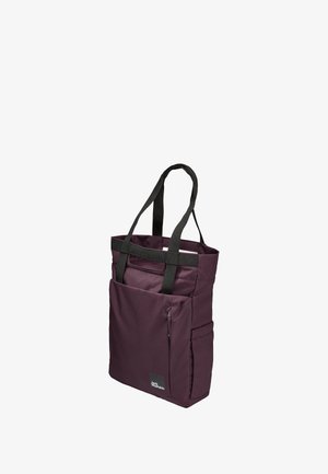 Paarse stoffen tote bag met zwarte banden, voorzien van een voorzak met ritssluiting en een extra zijzak voor gemakkelijke opslag.