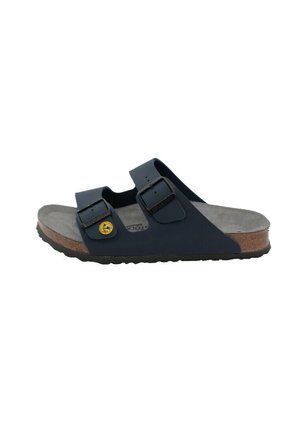 Navy blue sandal with two adjustable straps, textured footbed, cork midsole, and durable rubber outsole. Features logo detail on one strap.