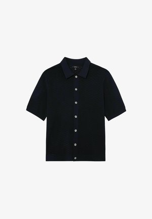 Black short-sleeve knit polo shirt with a button-down front and a solid collar.