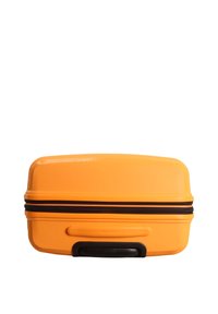Hard-shell orange suitcase with black zipper, smooth surface, rectangular shape, and a top handle for easy carrying.