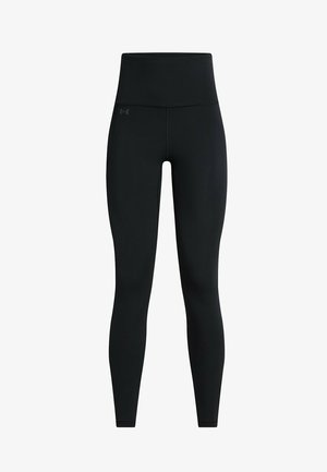 Black leggings featuring a high waistband, smooth fabric, and a fitted design. Includes subtle brand logo on the left side.