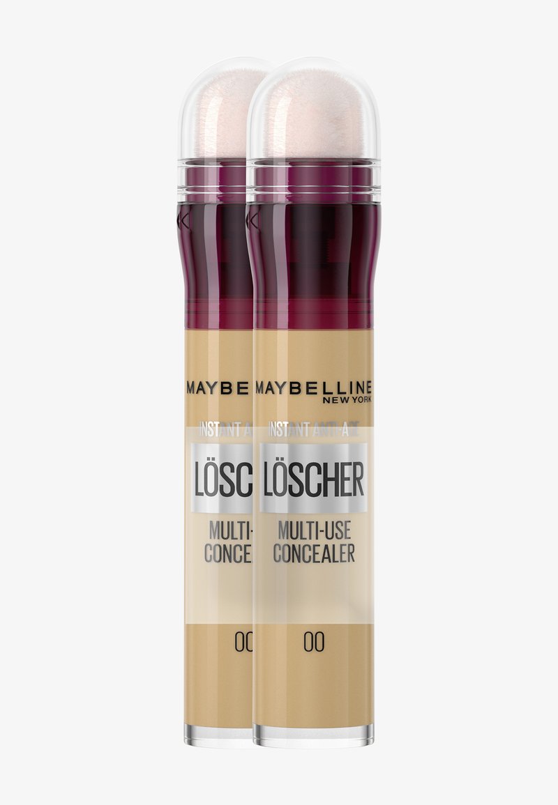 Maybelline Instant Anti-Age Correttori, due tubi, forma cilindrica, plastica trasparente, color marrone scuro e beige, punta dell'applicatore morbida, etichettati "Correttore Multiuso".