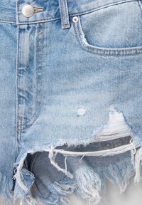Light blue denim shorts with frayed hem, distressed patches, and silver button closure. Detailed stitching along the waistband and pockets.
