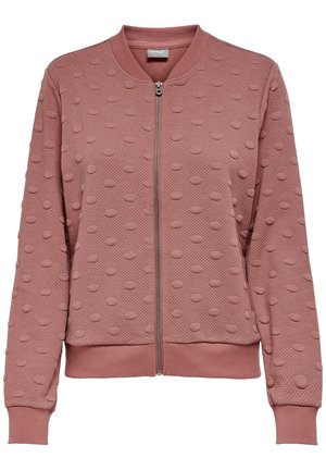 Veste mauve zippée avec texture à pois en relief, poignets et ourlet côtelés, et col rond.