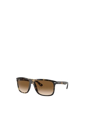 Occhiali da sole tartarugati con montatura quadrata, lenti a sfumatura bruna e logo Ray-Ban sulle aste. Finitura ad alta lucentezza.