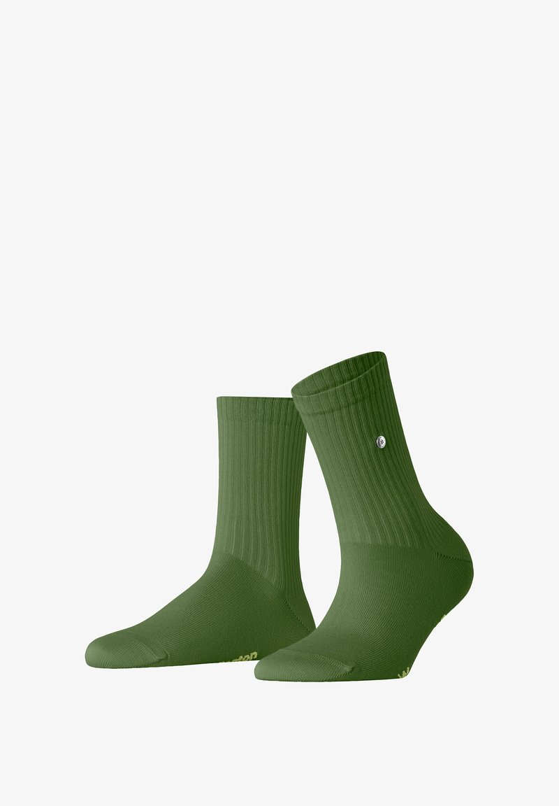 Zielone skarpety żebrowe o jednolitym wzorze, średniej wysokości, z wzmocnionym palcem. Posiadają małe logo z boku, wykonane z miękkiego materiału.