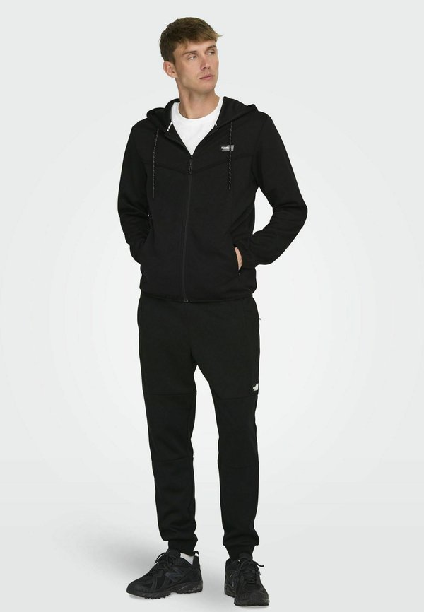 JOGGING NORMAL GESCHNITTEN  - Jogginghose - schwarz