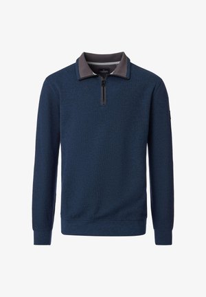 Navy pullover with a half-zip collar, contrasting gray collar, ribbed cuffs, and textured fabric. Features minimal branding on the sleeve.