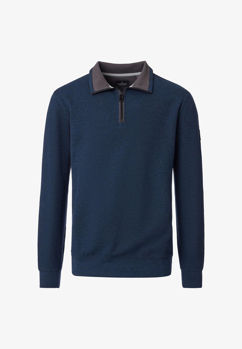 Navy pullover with a half-zip collar, contrasting gray collar, ribbed cuffs, and textured fabric. Features minimal branding on the sleeve.