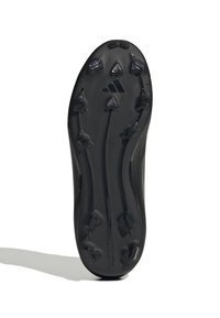 Sole di scarpini da football neri con tacchetti allungati e caratteristiche di trazione. Texture liscia con un logo del marchio visibile vicino al tallone.