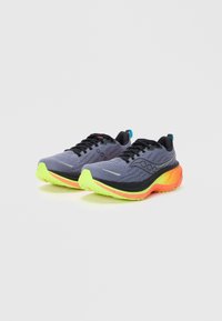 Running shoes featuring a gray mesh upper, black accents, and vibrant neon green and orange soles. Includes black laces and a textured design.