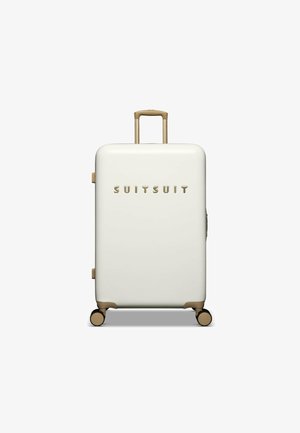 Harde witte koffer met gouden accenten, voorzien van een telescopische handgreep en vier wielen voor gemakkelijke mobiliteit. De merknaam "SUITSUIT" is in reliëf aangebracht.