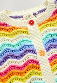 Cardigan lavorato a maglia con un motivo ondulato in colori vivaci: rosa, arancione, giallo, verde, blu e viola. Chiusura con bottone rosso davanti.
