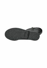 Czarna podeszwa buta wykonana z gumy, z teksturowaną powierzchnią dla lepszej przyczepności i detalem z logo. Zakrzywiony kształt z gładkim brzegiem.