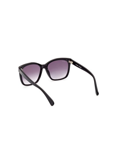 Svarta cat-eye solglasögon med gradient lila linser. Slät plastbåge, smala skalmar och subtila detaljer i guld.