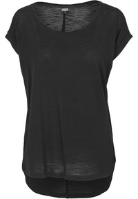 Haut noir à manches courtes avec un col rond, fabriqué en tissu léger. Présente un ourlet arrière légèrement plus long et une coupe décontractée.