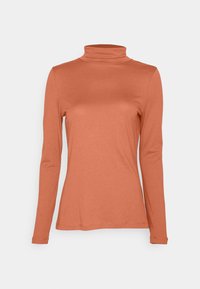 Rostfärgad turtleneck med lång ärm i slim fit, tillverkad av mjukt tyg med en slät textur, lämplig för lager på lager.