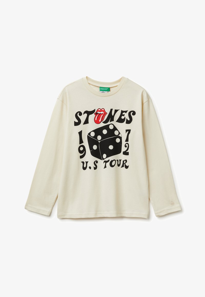 Cremefarbiges Langarm-T-Shirt mit rundem Halsausschnitt. Schriftzug mit einer Grafik von einer Zunge und Würfeln, mit "STONES 1972 U.S. TOUR" in fetter schwarzer Schrift.