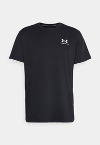 T-shirt nera a maniche corte realizzata in morbido tessuto, con scollatura rotonda e un piccolo logo bianco Under Armour sul petto.