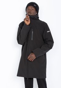 Schott LONG URBAN DÉPERLANT - Veste imperméable - noir