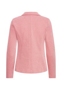Blazer rose à manches longues, col à revers, coupe cintrée et tissu texturé. Comprend un panneau arrière long et des détails de coutures.