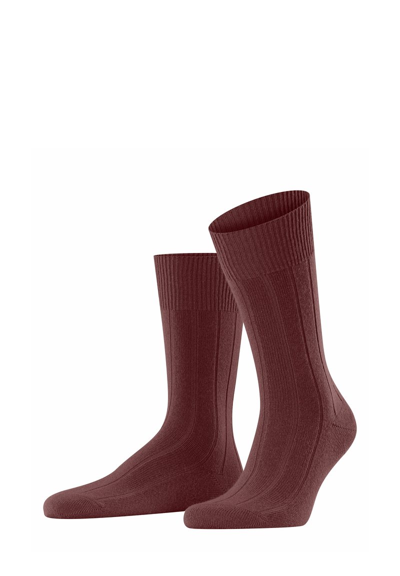 Mauve gerippte Socken mit mittellanger Schafthöhe, weich im Griff und verstärktem Fersen- und Zehenbereich für Haltbarkeit.