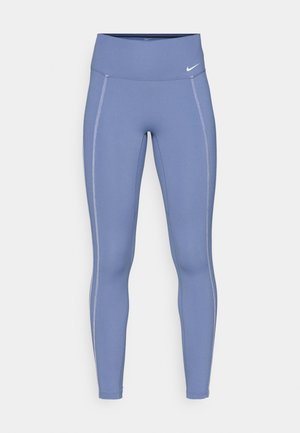 Niebieskie legginsy z wysokim stanem wykonane z elastycznej tkaniny. Posiadają kontrastowe szwy oraz małe białe logo na pasie. Prosty design.